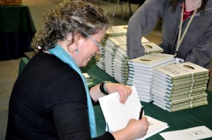 Signing copies of <em>Organic Manifesto</em>