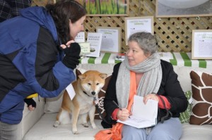 I did get to sign one book for a brave soul who didn't let the rain stop her. Of course, my grand-dog Penny was staying out of the rain, too!